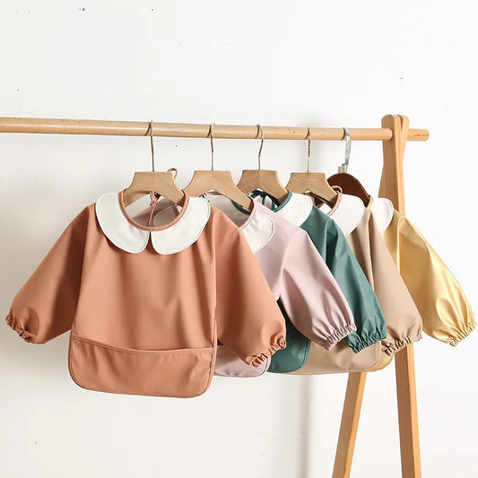 383-Bavoir en Similicuir à Manches Longues pour Bébé – Protection Pratique et Élégante